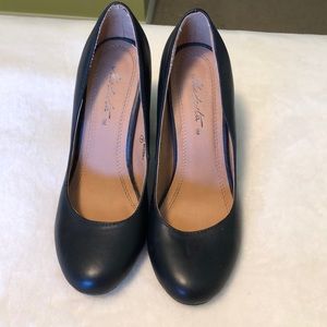 Chunky black heels. Size 7.